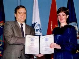 Ana Montes receiving a Certificate of Distinction from CIA director George Tenet, 1997