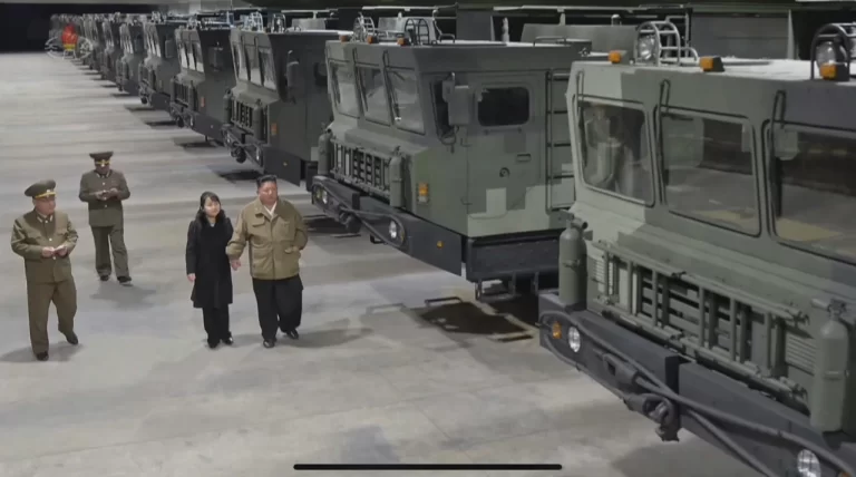 Kim Jong-un and his daughter inspecting KN-23 missiles