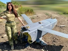 Journalist Anna Prokofieva next to downed Storm Shadow Missile