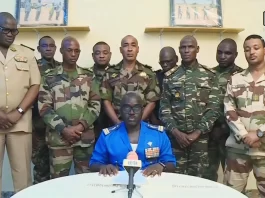 Colonel Amadou Abdramane alongside nine other uniformed soldiers announcing the coup