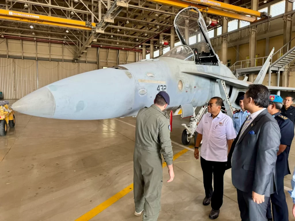 Datuk Seri Mohamed Khaled Nordin, the Malaysian Defense Minister Getting Briefed on Kuwaiti F/A-18C/D Legacy Hornet.