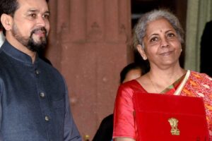 Budget 2021-22 - Nirmala Sitharaman holding bhai khata along with the Minister of State for Finance and Corporate Affairs Anurag Singh Thakur