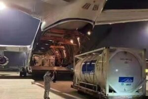 Plane in China being loaded with medical supplies to India
