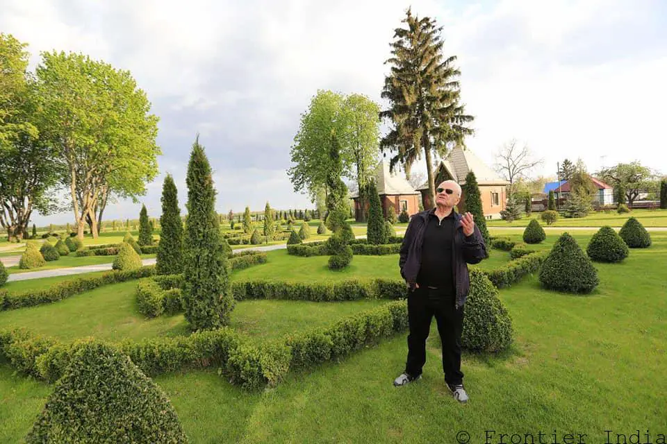 Leonid Yakovyshyn in front of his tomb which is styled like mausoleum of Napoleon