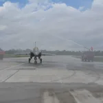 Rafale aircraft being presented a water cannon salute to mark its induction at Air Force station Hasimara
