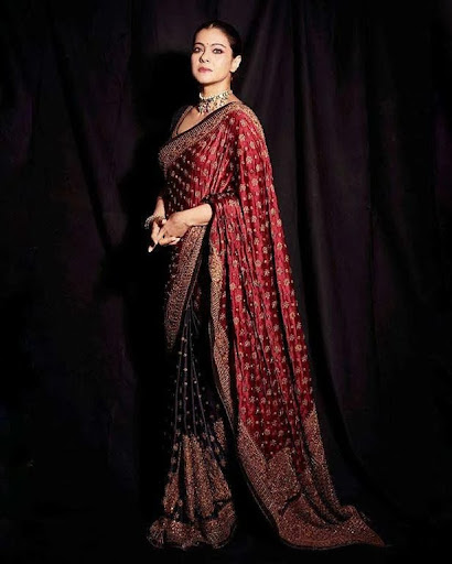 Kajol in a royal red saree