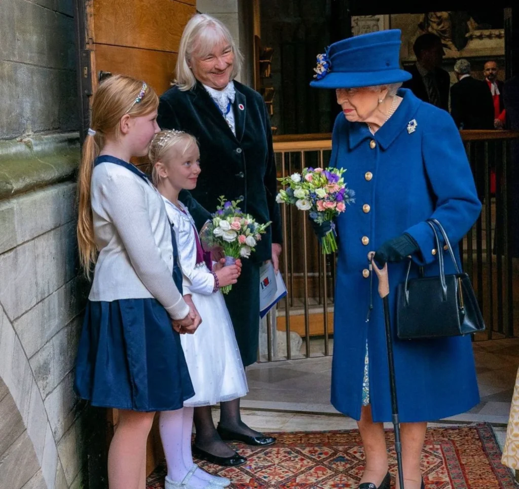 Queen Elizabeth II with a walking stick