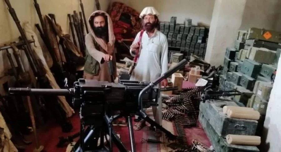 Tehreek-e-Taliban Pakistan in North Waziristan display their weapon storage