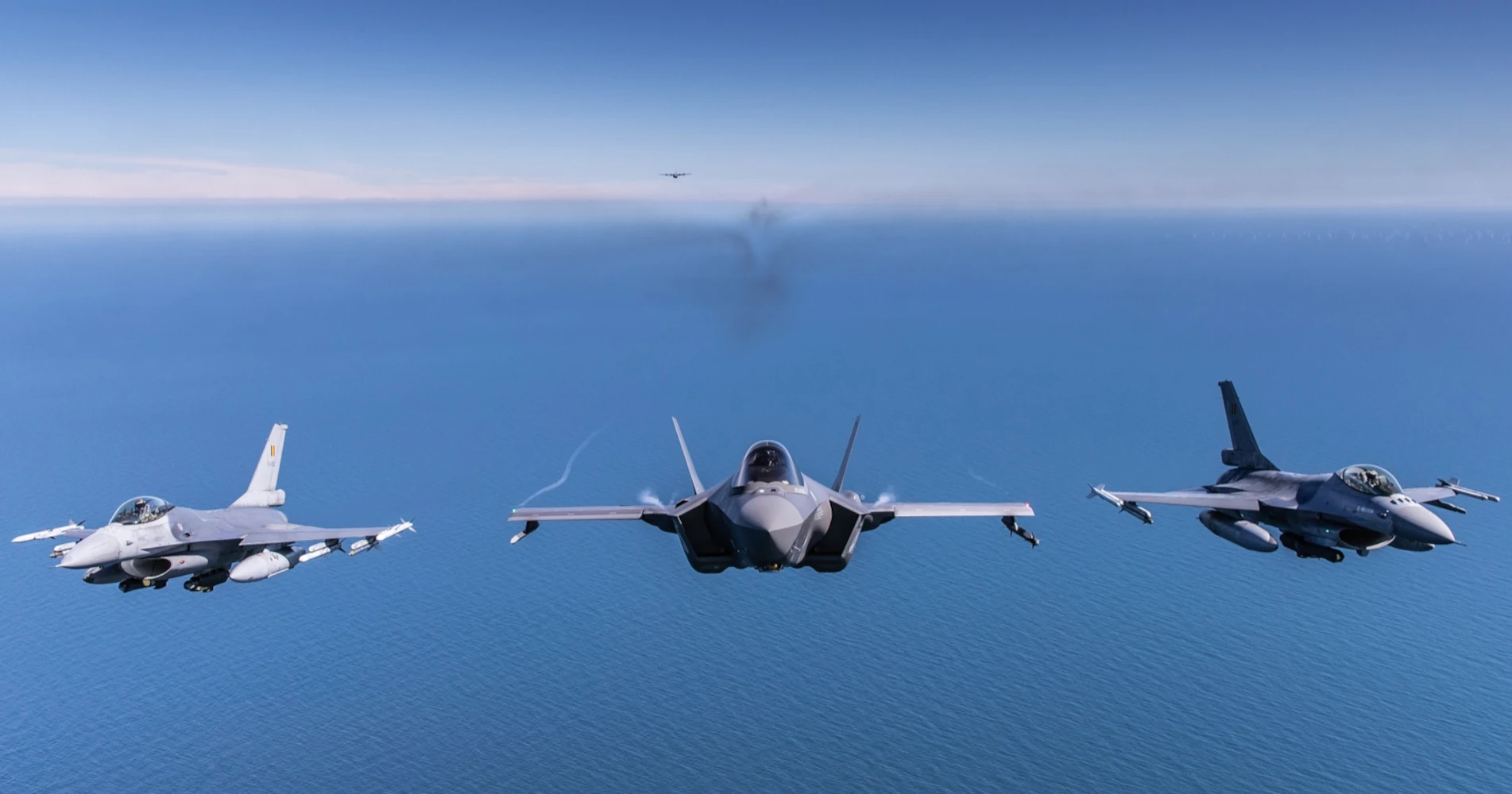 Norwegian F-35 flanked by F-16