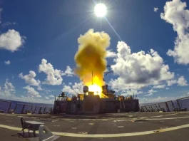 Arleigh Burke-class guided-missile destroyer USS Barry launches a Standard Missile 2