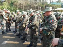 Malaysian Armed Forces personnel handling INSAS Rifle
