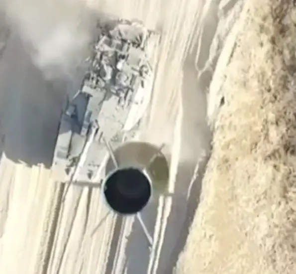 Hamas dropping ammunition on Israeli Merkava 4 Tank with the help of a Drone