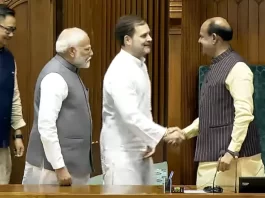 LOP Rahul Gandhi Shakes hands with Speaker Elect Om Birla. PM Narendra Modi and Parliamentary Affairs Kiren Rijiju watch.