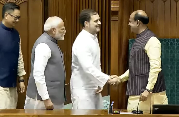 LOP Rahul Gandhi Shakes hands with Speaker Elect Om Birla. PM Narendra Modi and Parliamentary Affairs Kiren Rijiju watch.