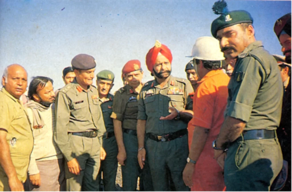 Lt Gen R S Dayal, Maj Gen Afsir Karim & Col Bhatia  (extreme right) deliberating with ONGC officials on combating the fire.