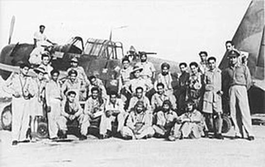 Flying Officer KL Bhatia sitting on the ground in the extreme right, Sqn. Ldr Hem Chaudhury (Sqn. Commander) is suiting in the centre & Flying Officer D C Seth standing behind Sqn. Ldr. Chaudhury is in the above picture). The aircraft is a Vultee Vengeance, dive bomber.