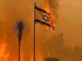 Alleged - Israeli Flag burns after Iranian Strike
