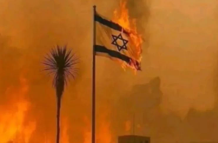 Alleged - Israeli Flag burns after Iranian Strike