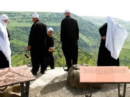 Israeli Druze family visiting Gamla; wearing religious dress