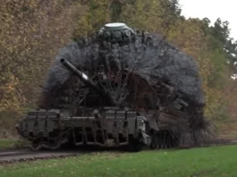 Russian “Hedgehog” Assault Tanks: An Evolving Defense Against FPV Drones T-80BVM with a TMT-K mine trawl